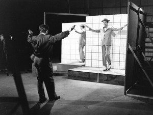 Buddy Ebsen dancing in front of a grid to assist in the creation of "Project Little Man."