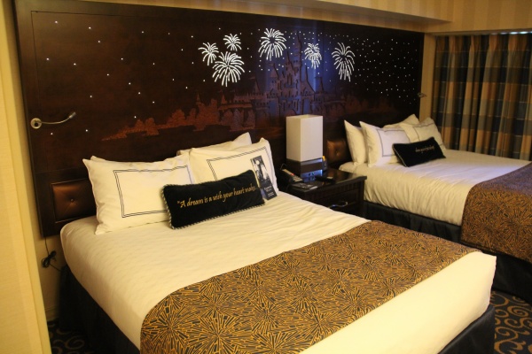 Magical Headboards featuring Sleeping Beauty Castle, Fireworks and Hidden Mickey's adorn the beds of Disneyland Hotel